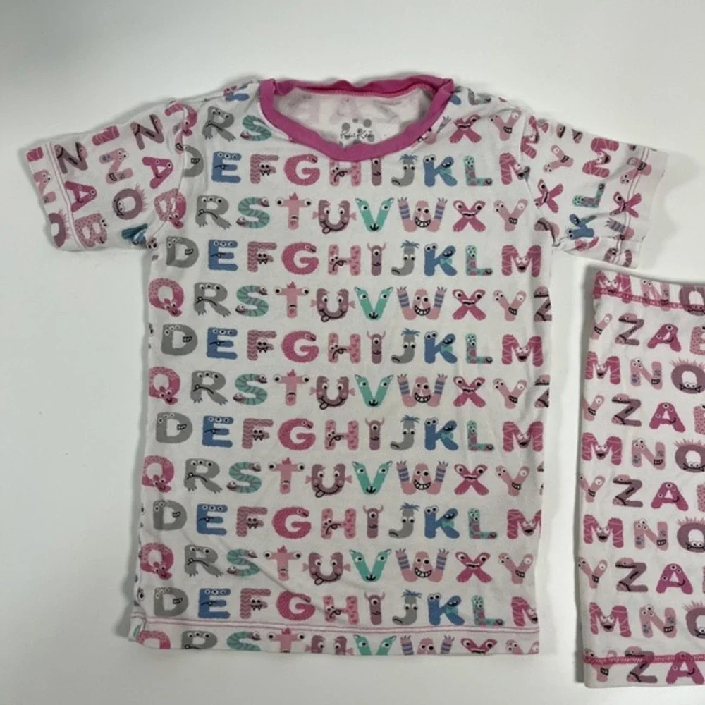 KicKee Graphic Short Sleeve Pajama Set, Ultra Soft and Snug Natural ABC Monsters